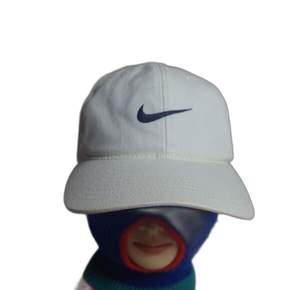 White tag Nike cap 90s with classic black swoosh logo on front panel vintage style