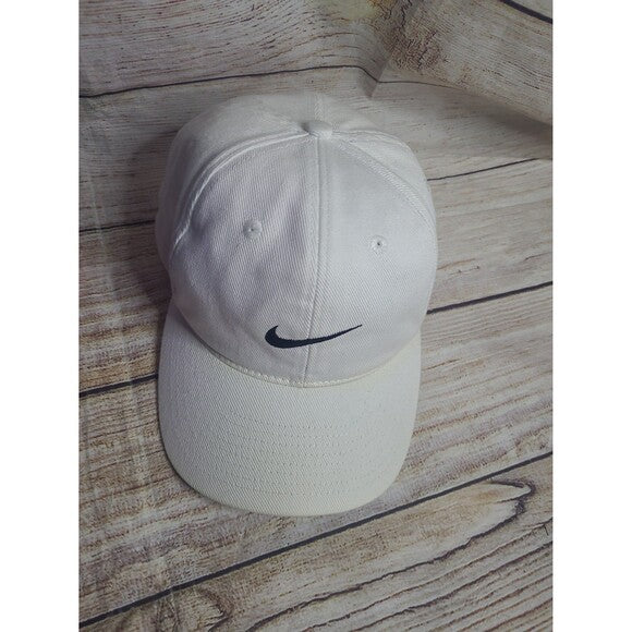 White tag Nike cap 90s with black embroidered swoosh logo on front panel