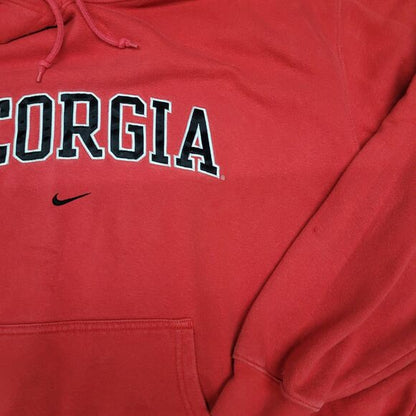 Red center swoosh Nike Bulldogs hoodie with Georgia text and front pocket