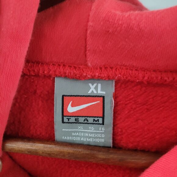 Tag inside center swoosh Nike Bulldogs hoodie showing size XL and made in Mexico label