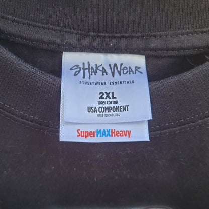 Close up of Shaka Wear label on black Virginia is for Legends Y2k tee size 2XL made of 100 percent cotton